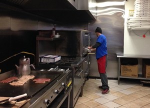 worker making pizza more than pizza new haven