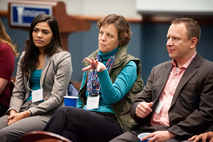 Vern Williams photo | Juliemar Ortiz, Catherine Sullivan-DeCarlo, and Mike Smith, speak to Southern students at Alumni Night Dec. 1.