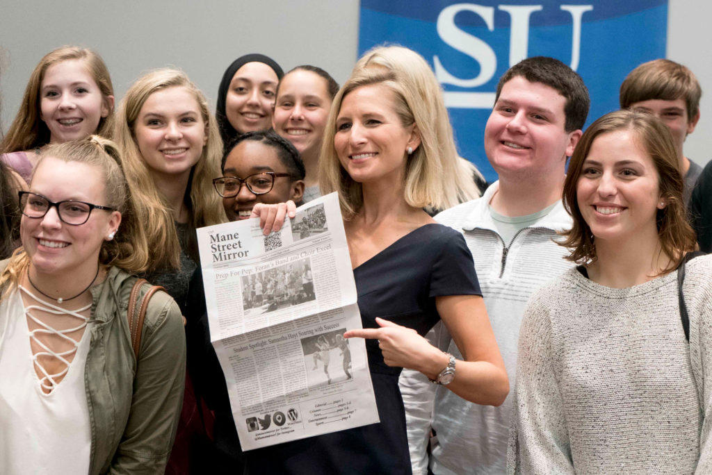 Candid Jenn Bernstein with students