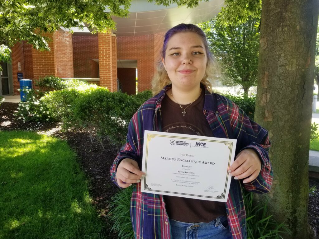 Sofia Rositani poses with her award certificate.